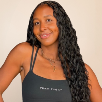 Portrait of a Pilates instructor featured on the Figue Madera Pilates team page.